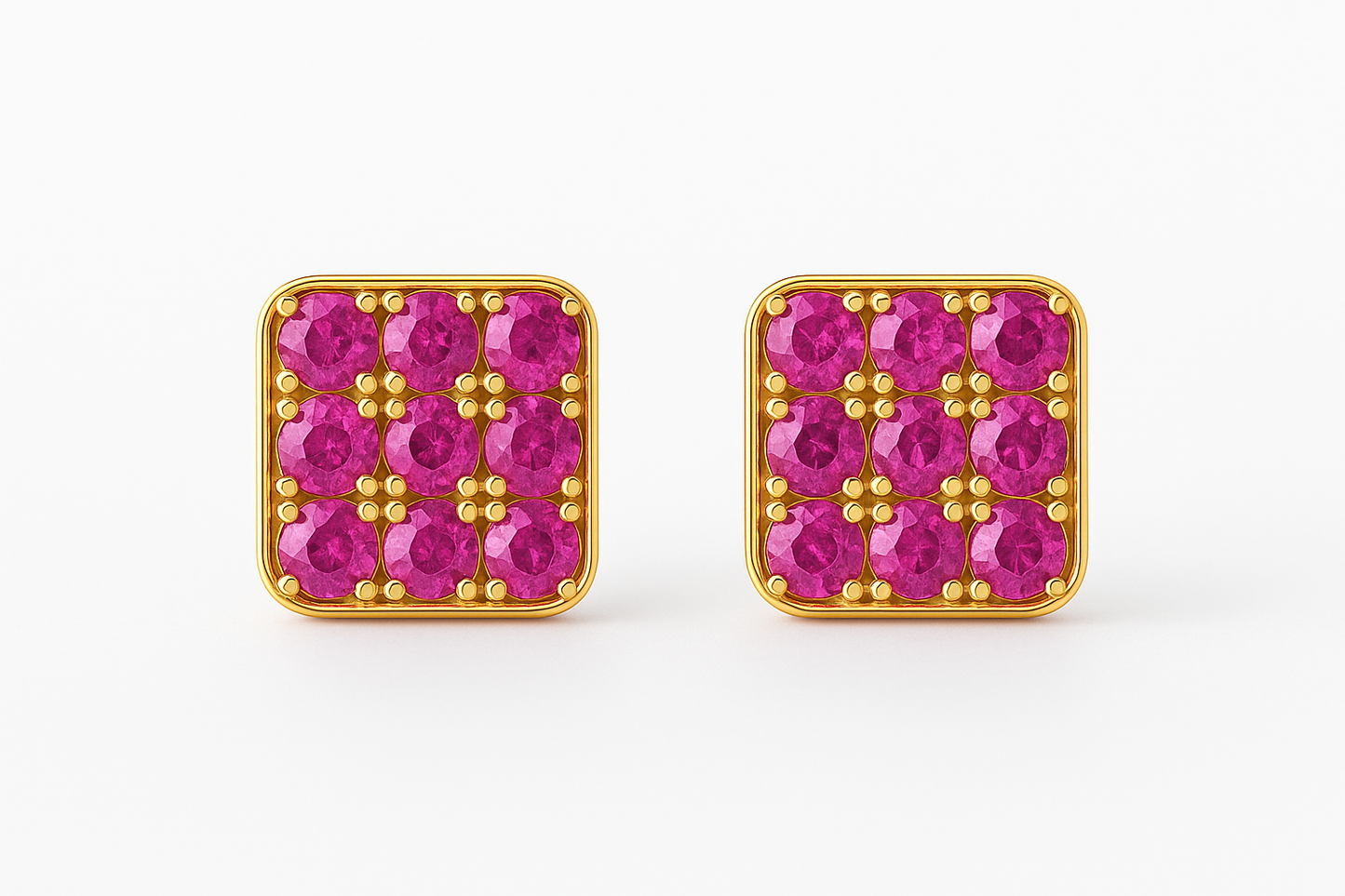 Square gold stud earrings featuring a grid of vivid red rubies set in a rounded-edge frame, with delicate gold bead prongs accentuating each stone. Displayed on a soft cream background with a subtle reflection.