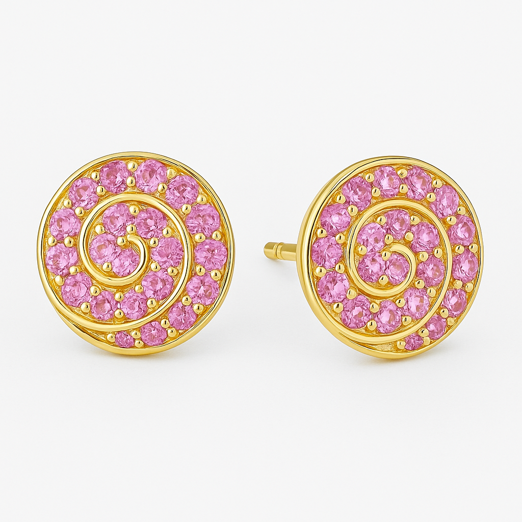 A pair of round gold stud earrings featuring a spiral design set with vibrant pink sapphires. Each earring showcases 14 gemstones intricately arranged along a golden swirl pattern, displayed against a soft cream background.