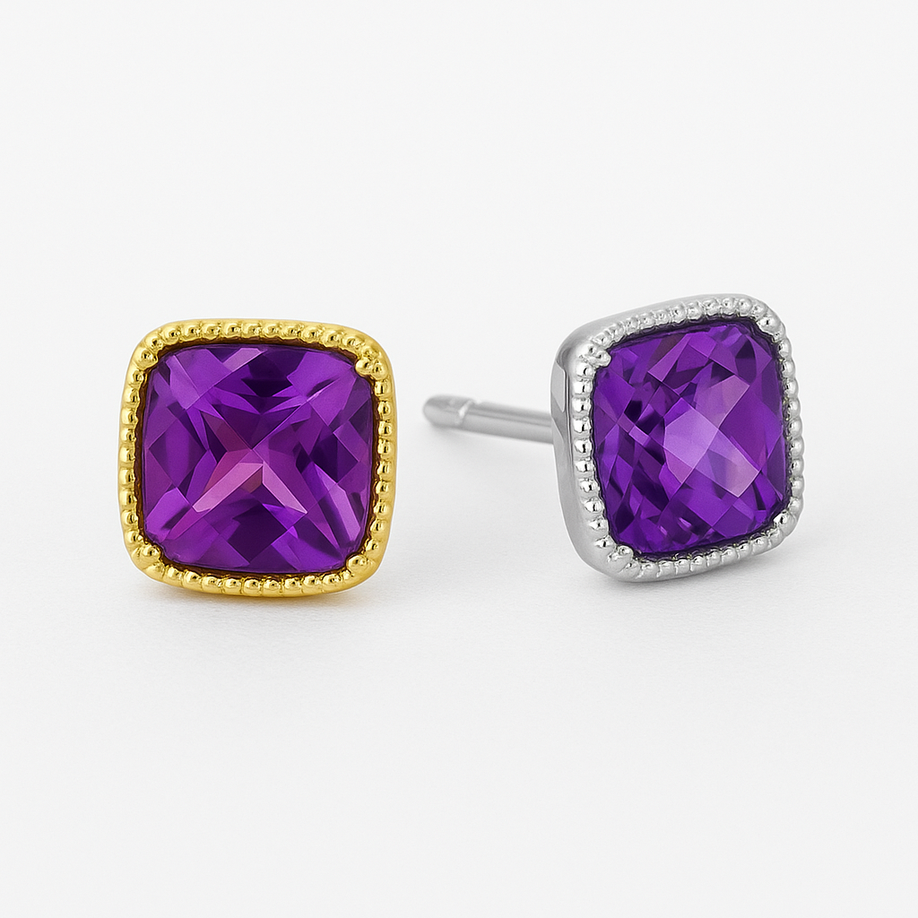 Cushion-cut amethyst stud earrings set in a square gold bezel with delicate beaded detailing along the border, displayed on a soft cream background with a gentle reflection.