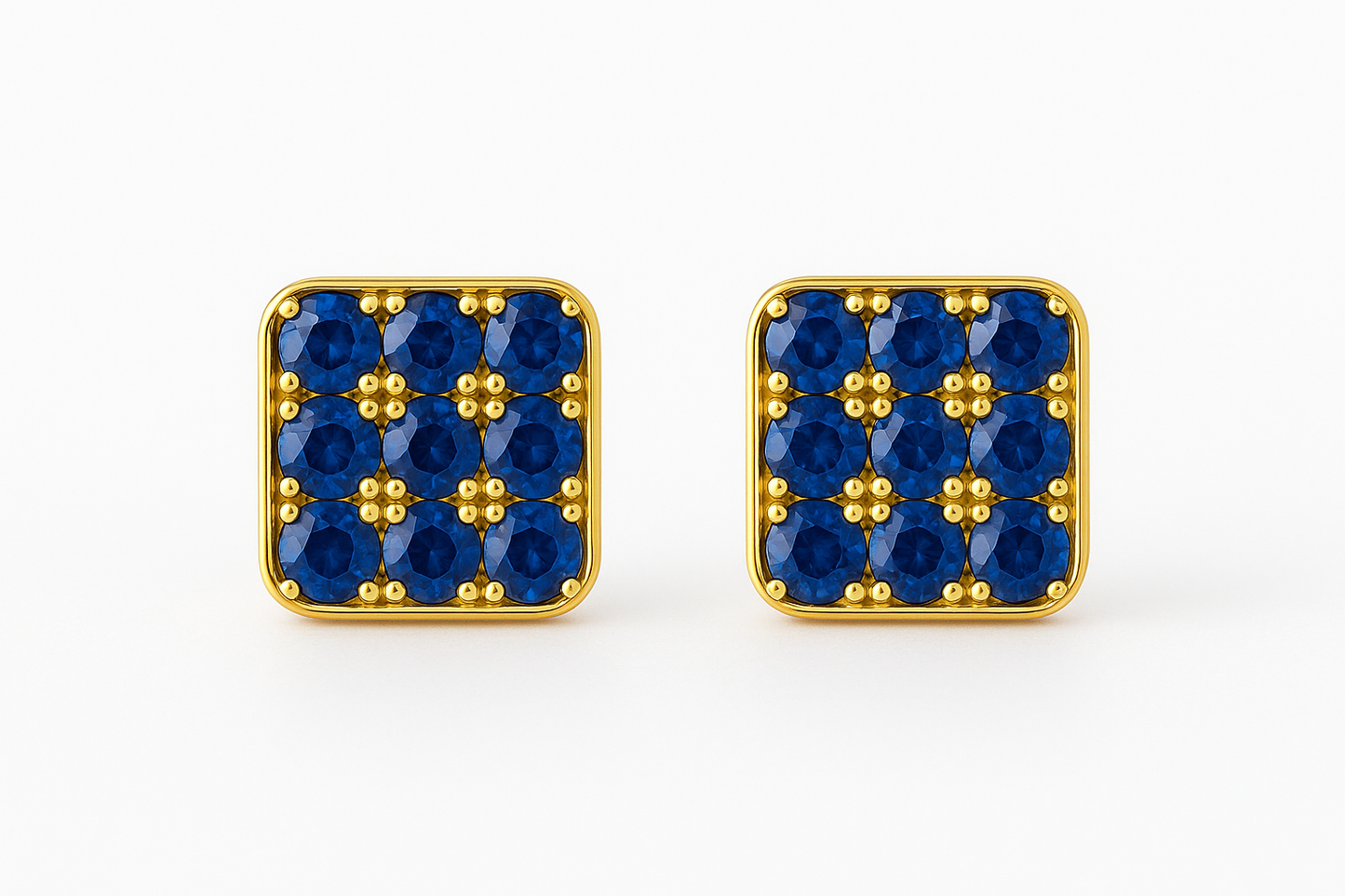 Square 18k gold stud earrings featuring a grid of vivid blue sapphires set in a rounded-edge frame, with delicate gold bead prongs accentuating each stone. Displayed on a soft cream background with a subtle reflection.