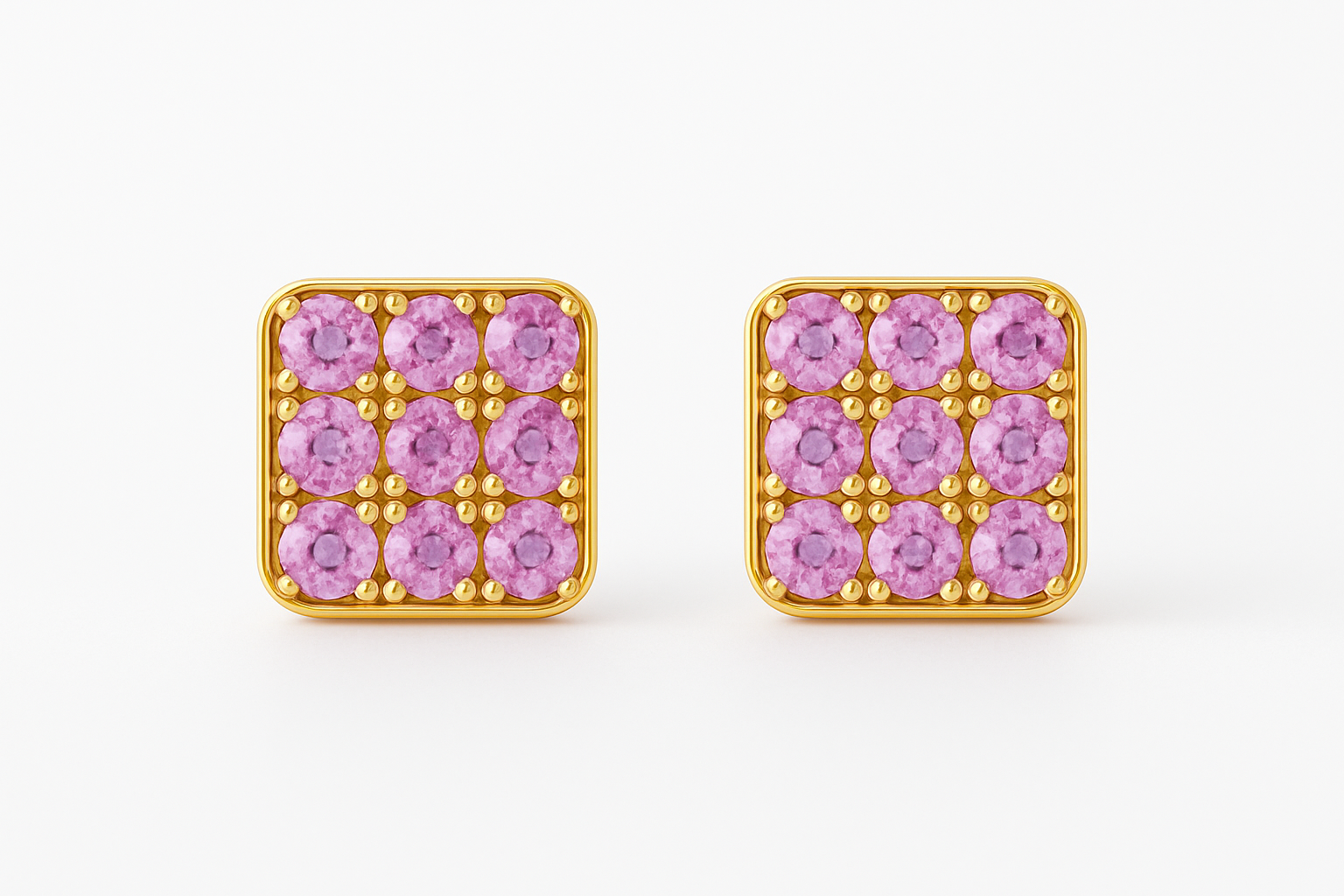 Square gold stud earrings featuring a grid of vivid pink sapphires set in a rounded-edge frame, with delicate gold bead prongs accentuating each stone. Displayed on a soft cream background with a subtle reflection.







