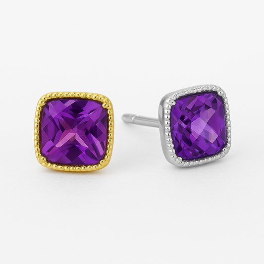 Cushion-cut amethyst stud earrings set in a square gold bezel with delicate beaded detailing along the border, displayed on a soft cream background with a gentle reflection.